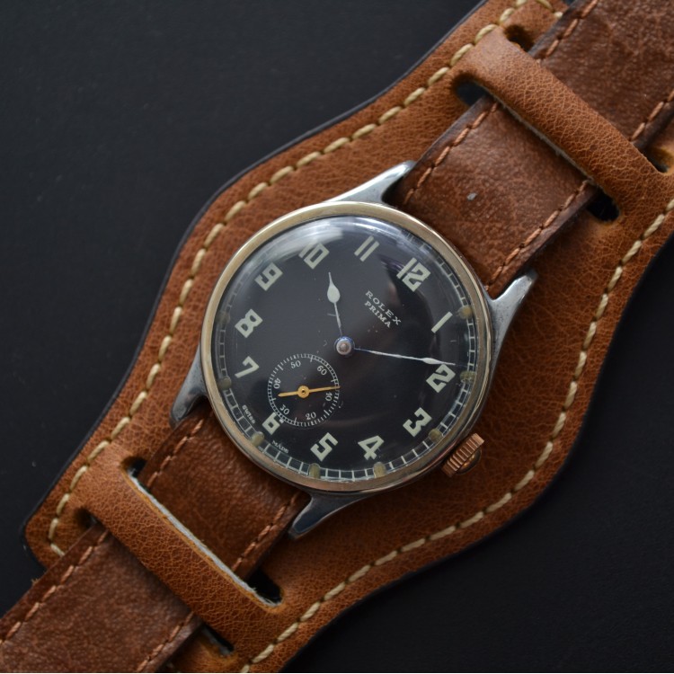 32mm Rolex bubbleback dirty dozen issued British military 1940s vintage mens wristwatch manual wind original black dial WW2