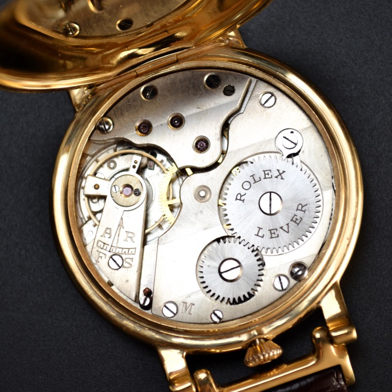 Rolex 1920s movement, 15-jewel lever caliber with Rolex signature, visible balance wheel and gear train