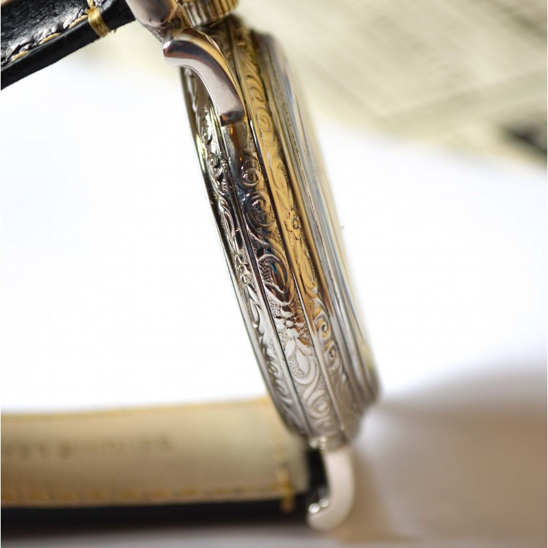 Rolex Unicorn 45mm case side close-up showing art deco scroll engraving on guilloche bezel and polished case flank, circa 1930s