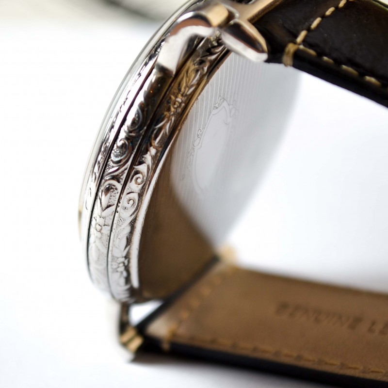 Rolex Unicorn 45mm case back angled view showing guilloche engine turning, engraved bezel and wire lug, circa 1930s