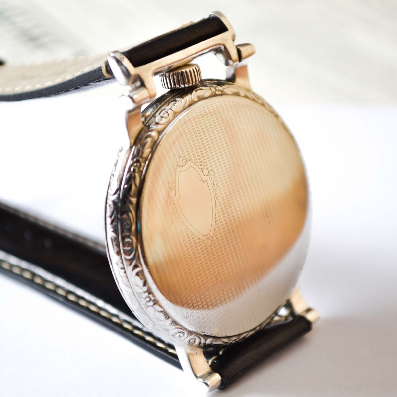 Rolex Unicorn 45mm case back three-quarter view showing engine-turned guilloche pattern, crown and wire lugs, circa 1930s