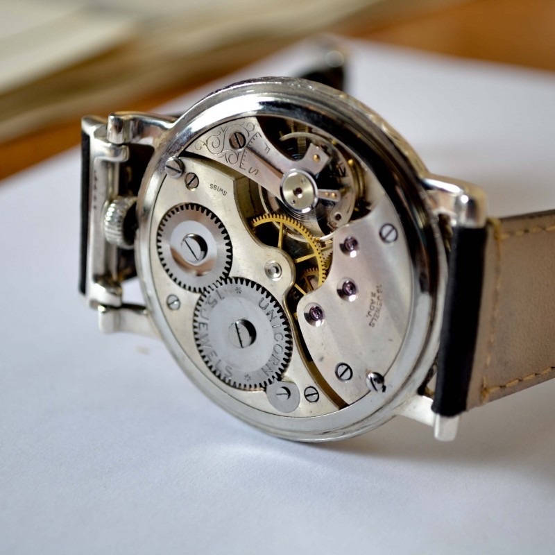 Rolex Unicorn caliber movement view showing Swiss lever escapement, jeweled bridges and polished train wheels, circa 1930s