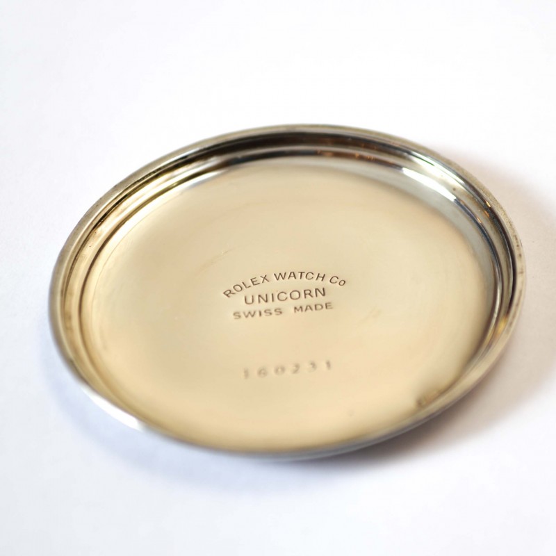 Rolex Unicorn inner case cover signed with 'ROLEX WATCH CO UNICORN SWISS MADE' and serial number 160231, circa 1930s