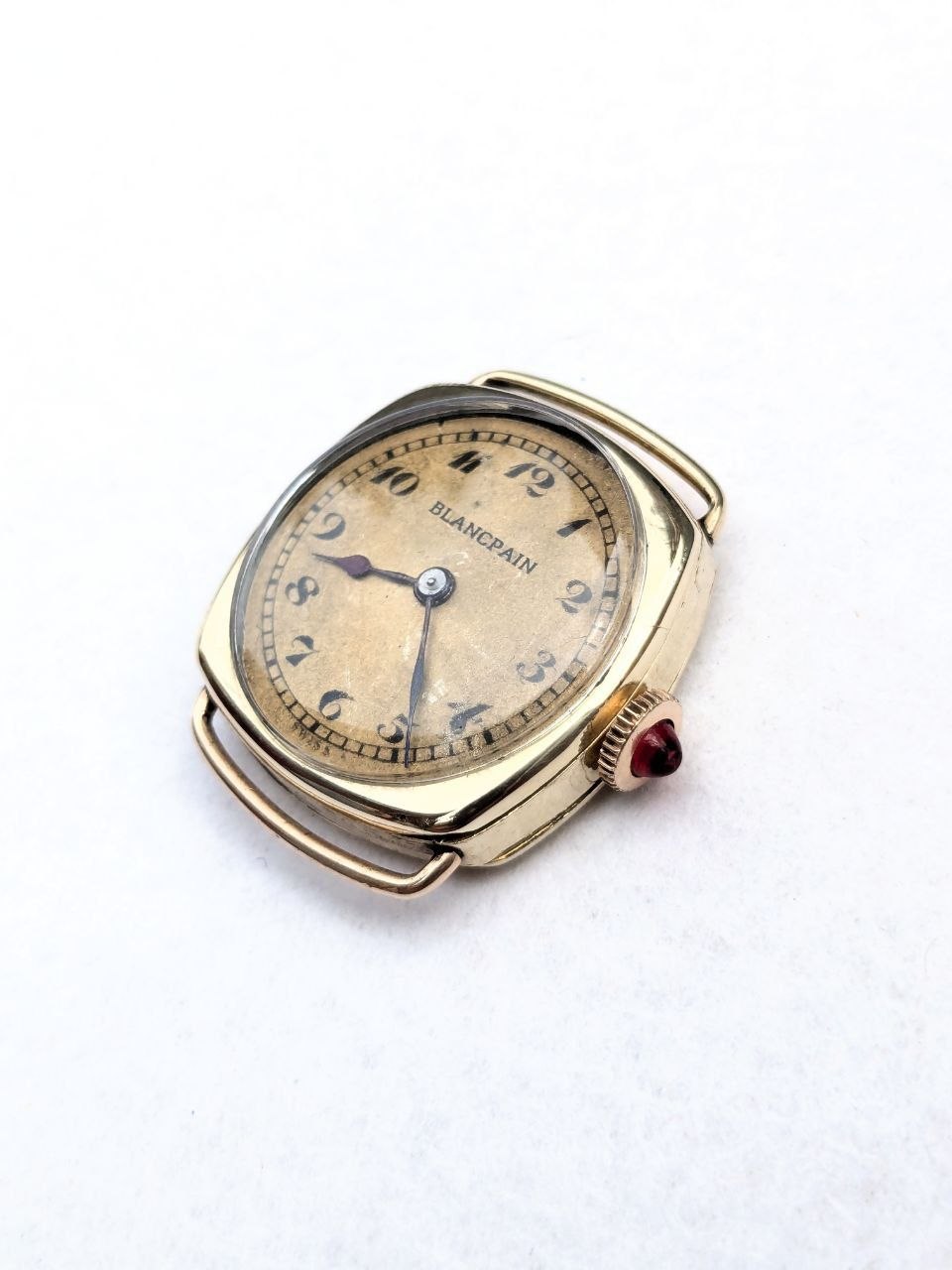 Rare Blancpain trench watch cushion gold‑plated case with ruby crown and 16mm lugs – vintage 1920s