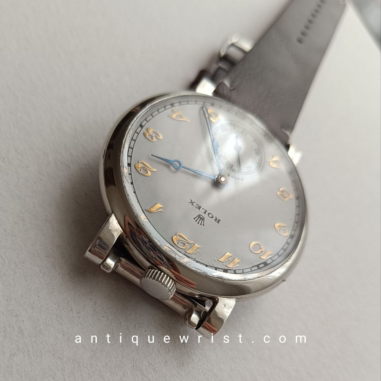 Classic 48mm military Rolex wristwatch with Arabic numeral dial, blued steel hands, and a clean, scratch-free crystal – ready for collector's rotation.