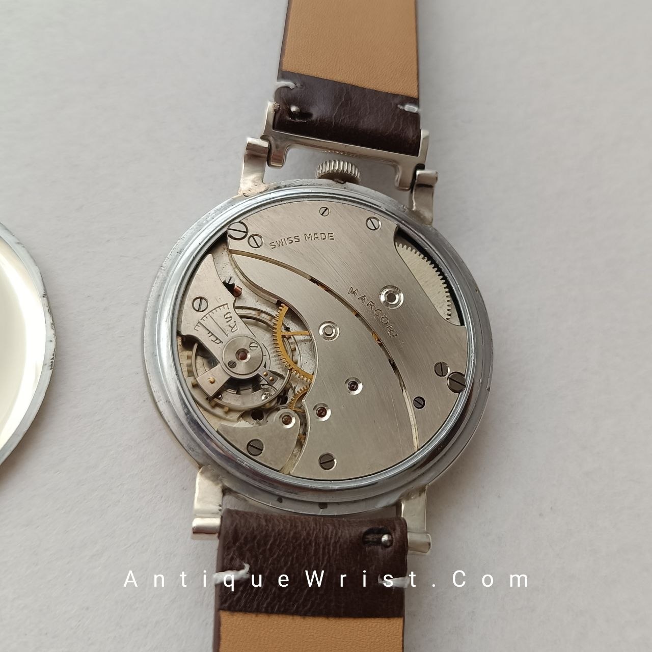 Close-up of the 15-jewel Rolex Marconi hand-winding caliber – Swiss lever escapement, Breguet balance hairspring, fully serviced and timed for reliable performance.