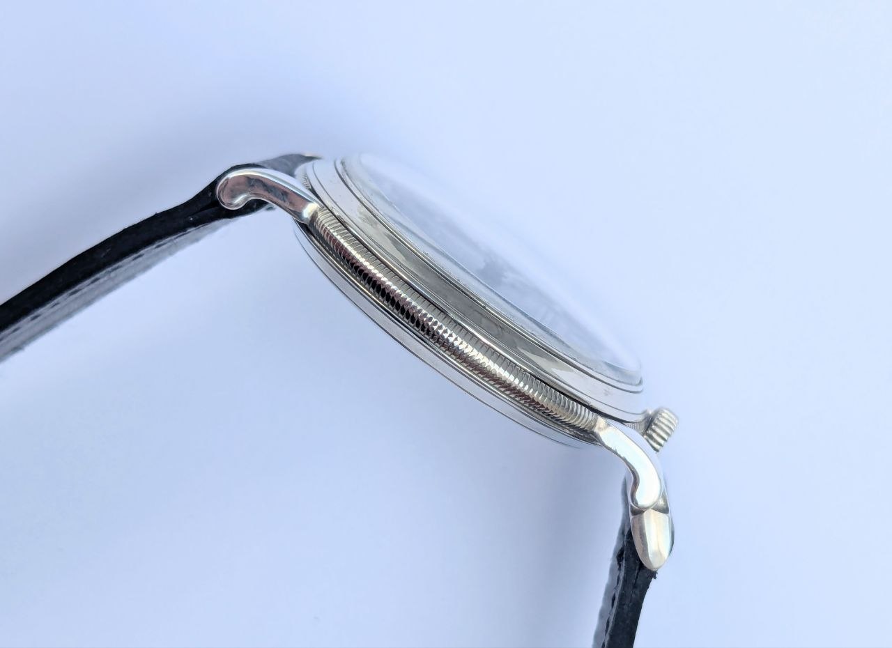 Rolex Chronometer 25 World's Records nickel case, three-quarter view showing case construction and crown