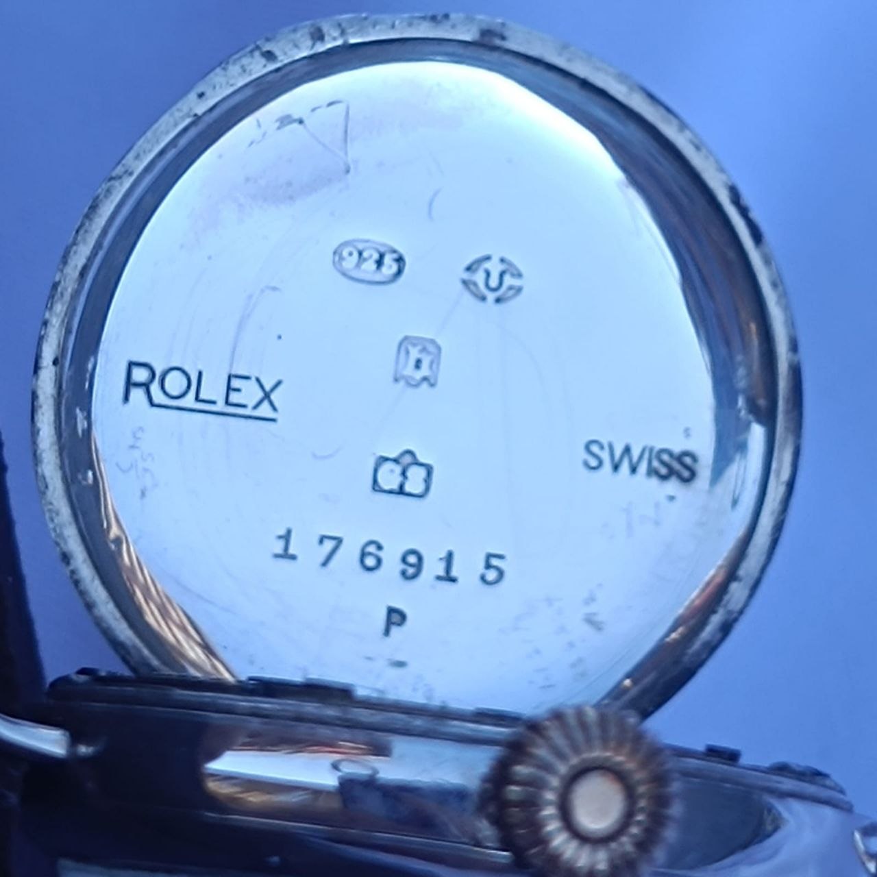 Inside case back of Rolex Rolco featuring London Assay silver hallmarks, serial 176915, date letter "b" for 1916, and George Stockwell maker's stamp.