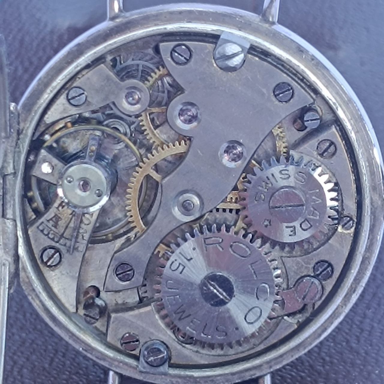 Manual-wind mechanical movement of Rolex Rolco with 15 jewels, ancre lever escapement, and signed ROLCO bridge – needs professional service.