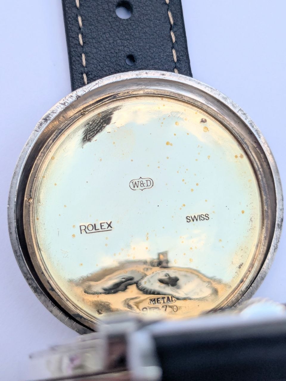 Rolex hallmarks on inner case cover, Swiss silver stamps and coronet, Marconi chronometer