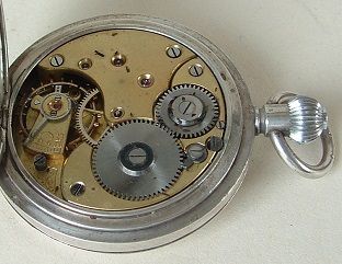 Omega pocket watch movement before conversion — original caliber in silver case