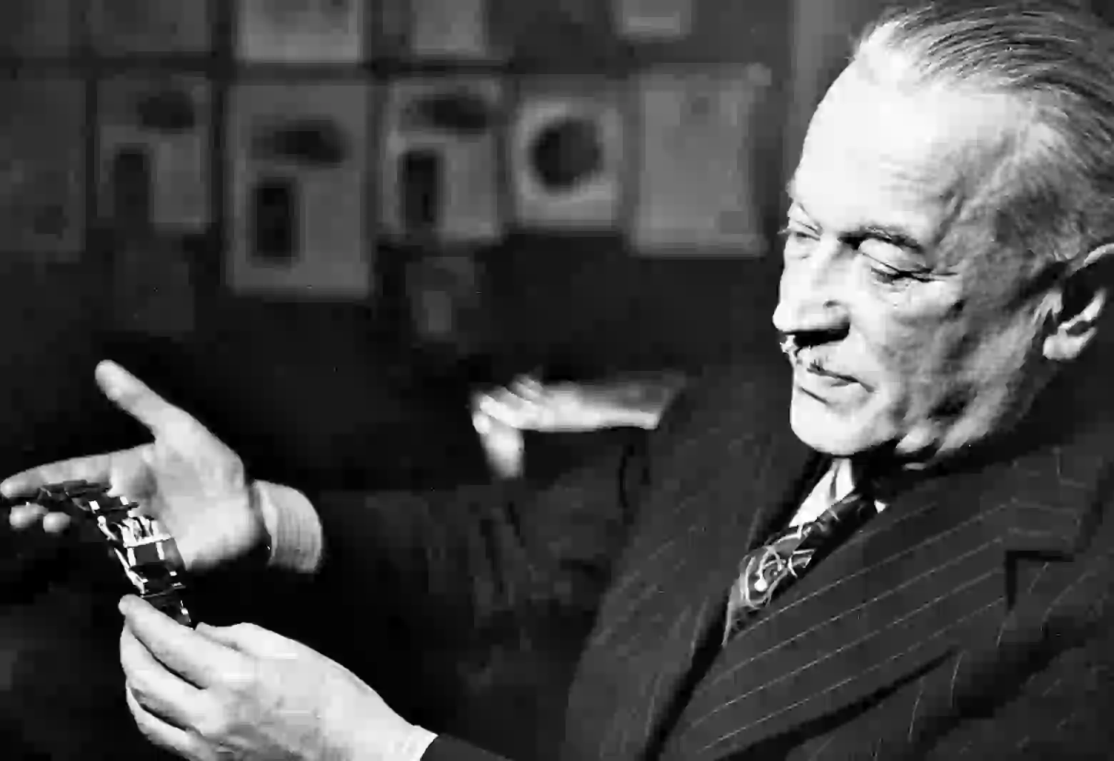 Hans Wilsdorf, founder of Rolex, with an early wristwatch — the era behind the vintage Rolex collection